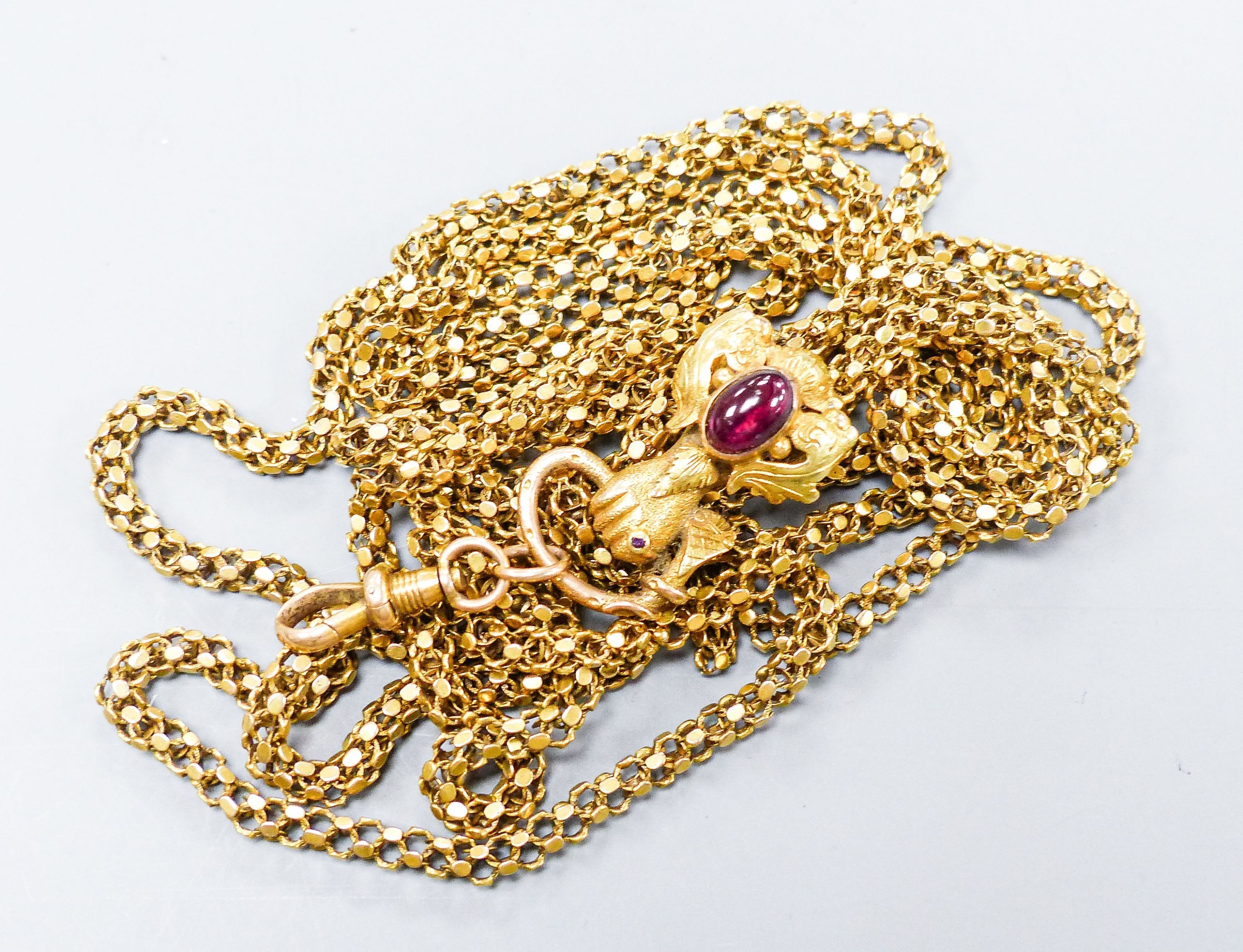 A Victorian yellow metal box link muff chain with cabochon amethyst set gauntlet suspension loop, (a.f.), appro. 170cm
